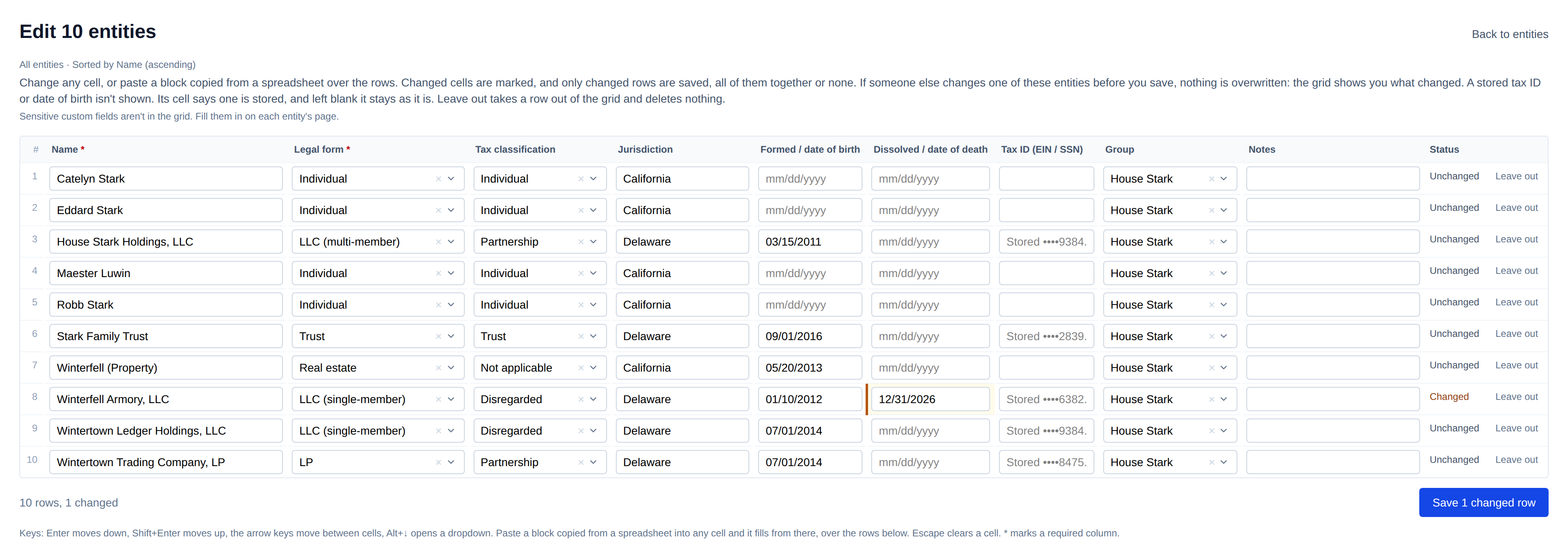 The batch edit grid open on ten House Stark entities as an editable spreadsheet, with one changed cell, Winterfell Armory, LLC's dissolution date, marked Changed and a Save 1 changed row button.